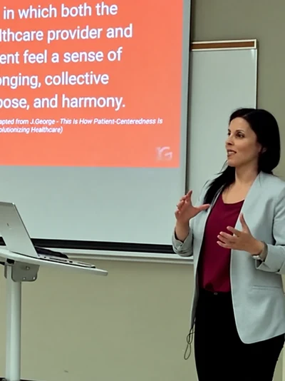 Jennifer George presenting a keynote on patient-centred care and communication